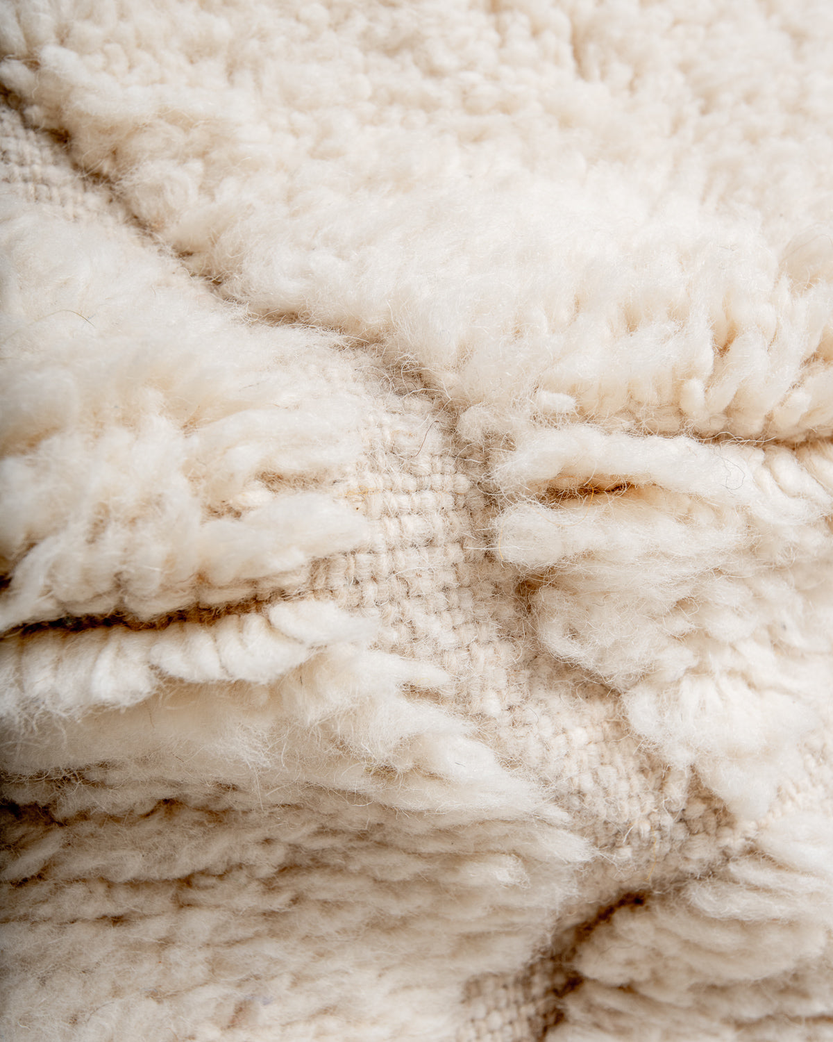 Modern, designer, handcrafted Berber rug from Morocco. Beniourain carpet with beautiful colours and patterns and fluffy wool texture.